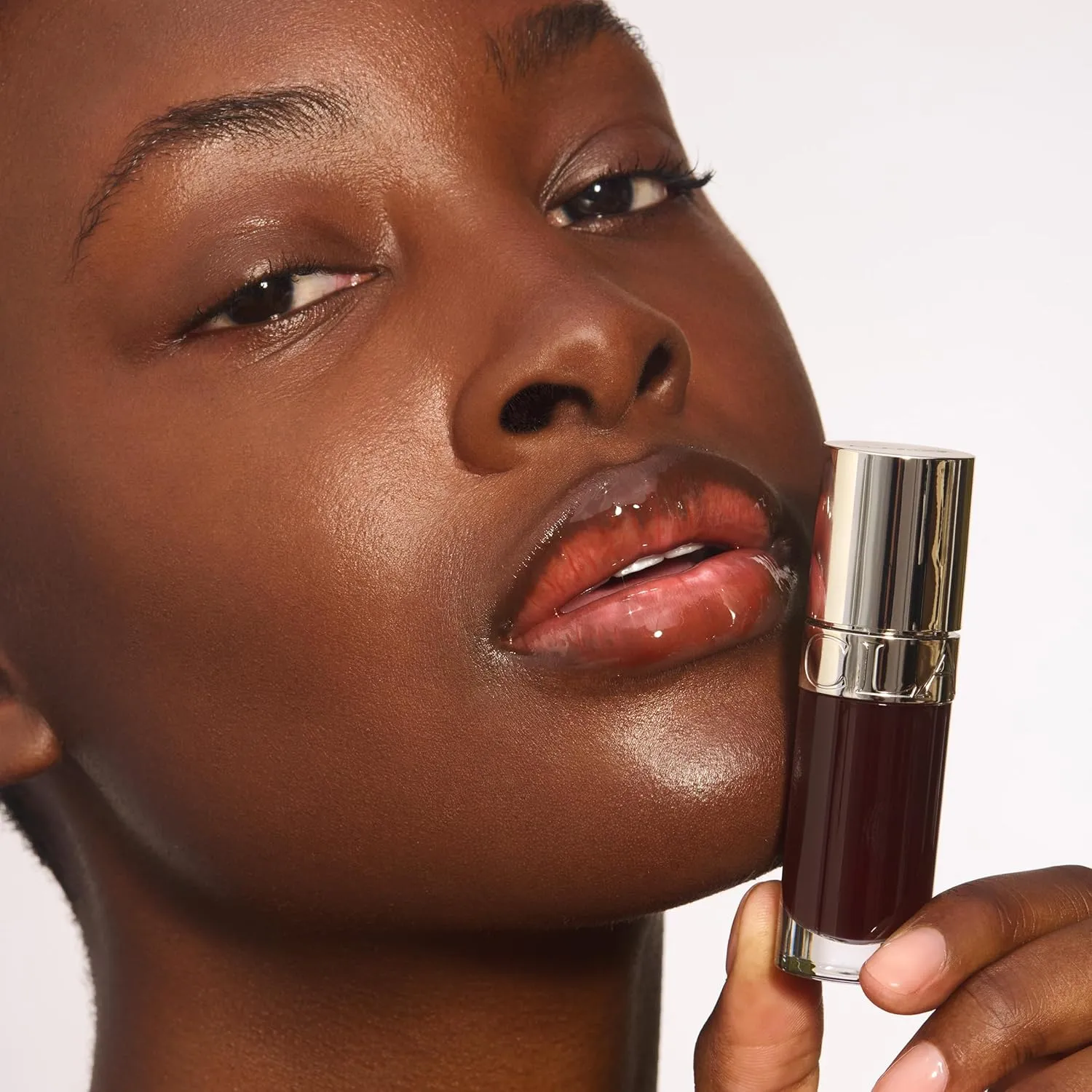 Clarins Lip Comfort Oil | Hydrating, Nourishing and Moisturizing Lip Oil | Sheer, High Shine Finish | Soothes, Comforts and Protects Lips | Visibly Plumps | 93% Natural Ingredients | 0.2 Ounces