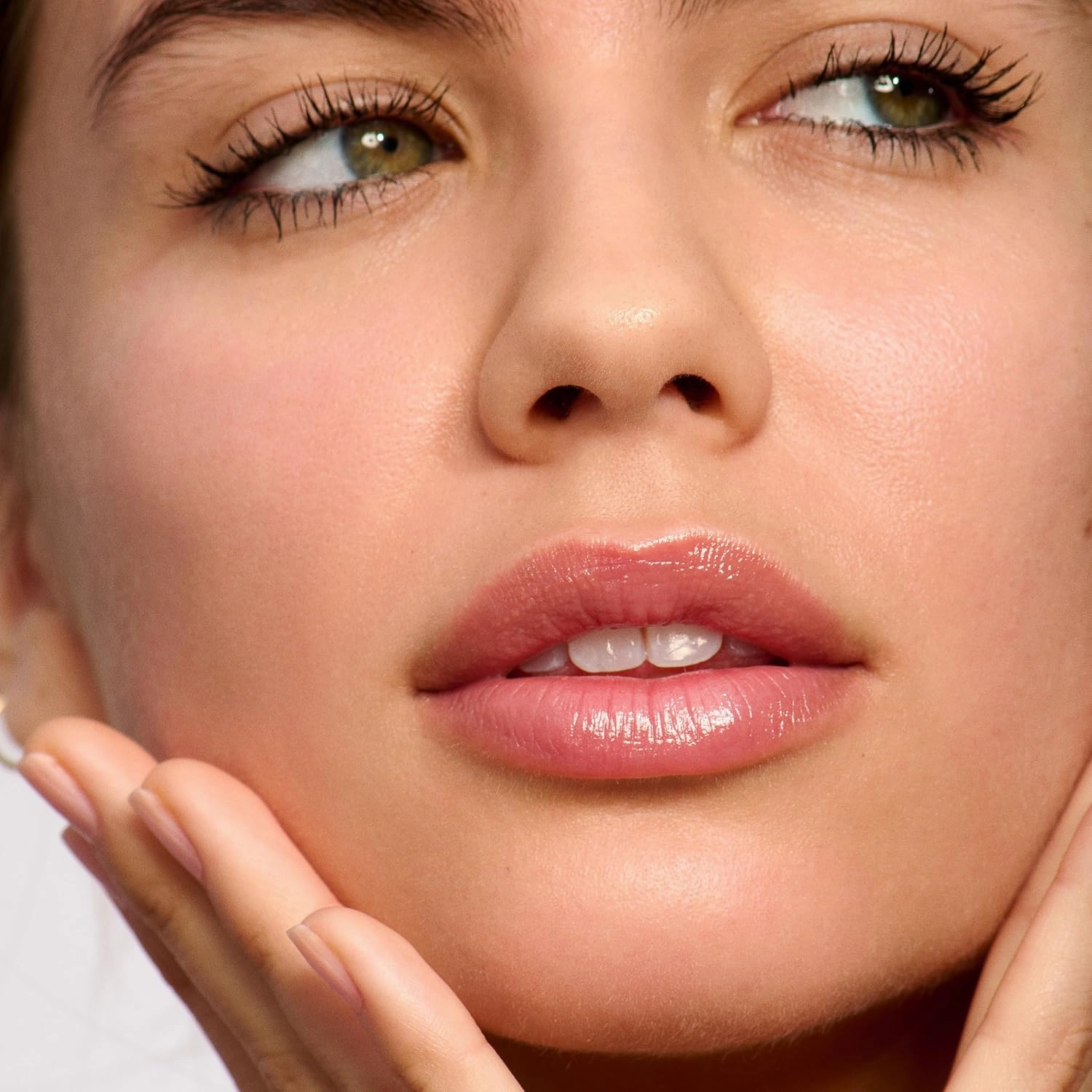 Clarins Lip Oil Balm | Nourishes, Hydrates, and Visibly Plumps | Natural Look | Sheer Finish and Shine | 99% Skincare Formula and 96% Natural Ingredients | Contains Hydrating Peptide | 0.1 Ounce