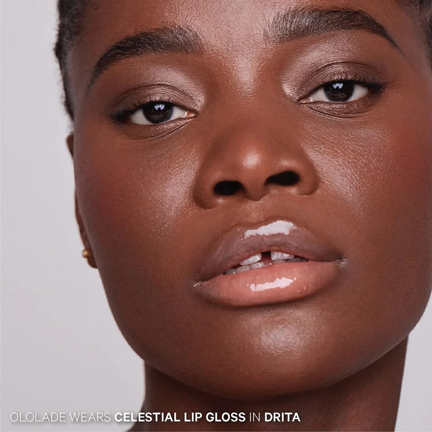 Kevyn Aucoin Celestial Lip Gloss, Drita (creamy sheer nude): Light reflecting shine & sheer. Precision makeup artist applicator. Hydrating, non-stick formula. Multi-dimensional 3D plumping effect.